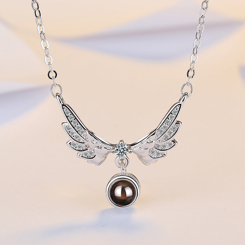 Female Angel Wing Projection Necklace
