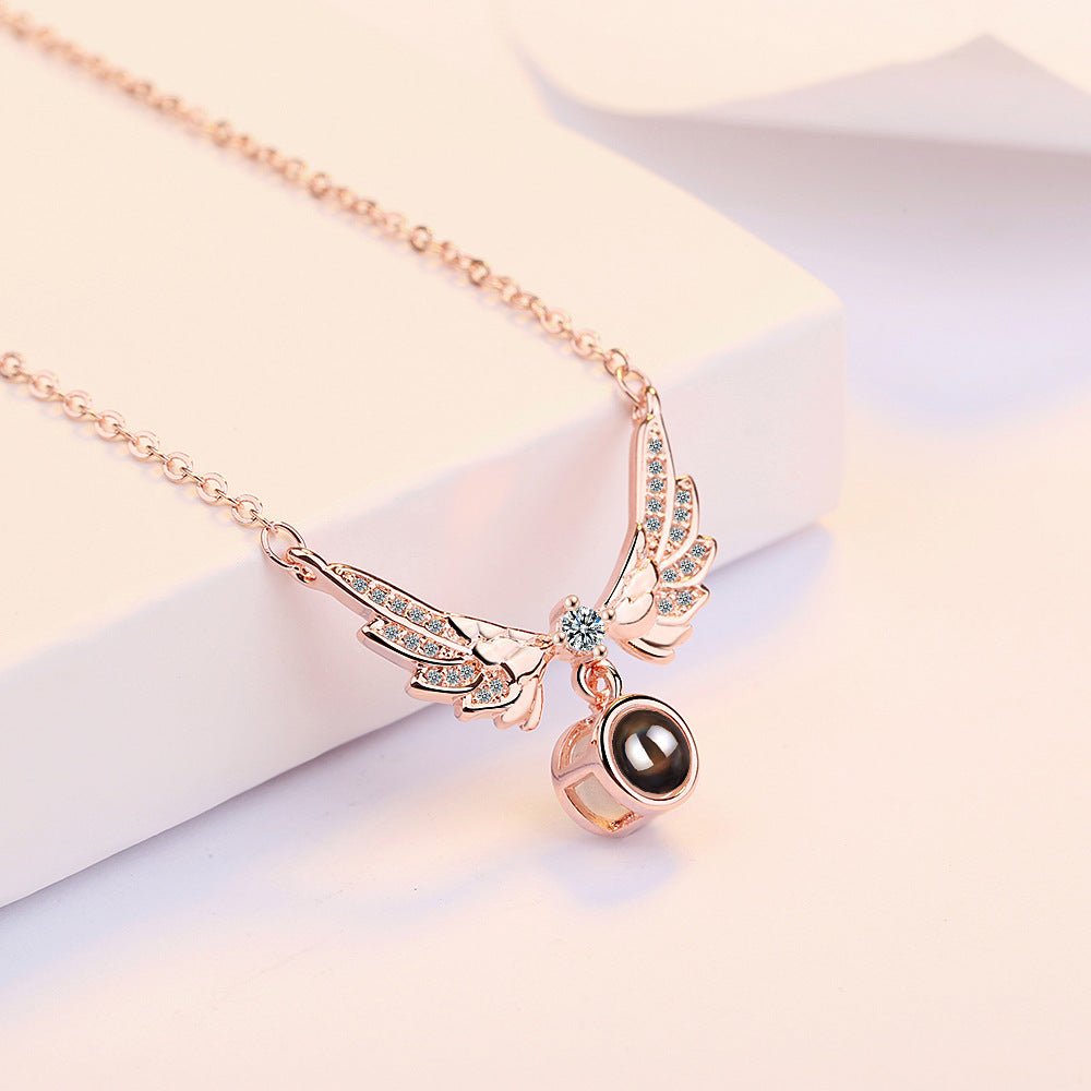Female Angel Wing Projection Necklace