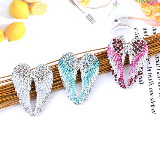 Angel wings brooch