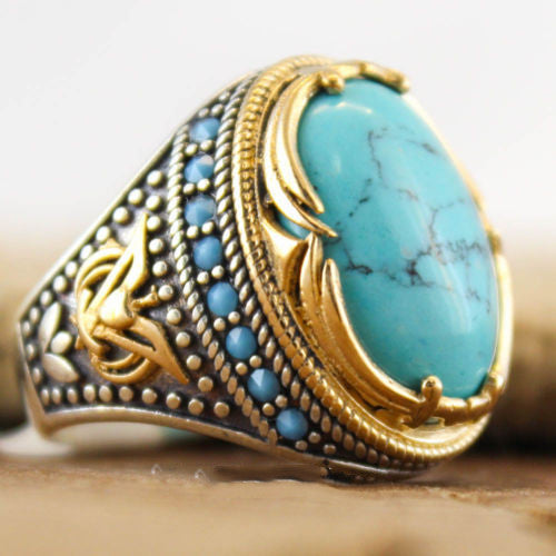 Exaggerated ring inlaid with natural turquoise