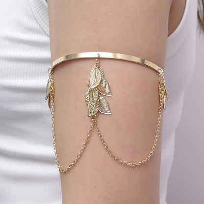 Handcrafted Gold-plated Geometric Cuff Bracelets And Boho-chic Metal Tassel Arm Rings With Vintage-inspired Exaggerated Water Drop Designs, Offering Unisex Luxury Accessories In Open Bangle Styles