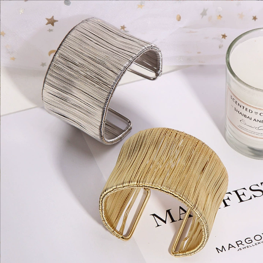 Handcrafted Gold-plated Geometric Cuff Bracelets And Boho-chic Metal Tassel Arm Rings With Vintage-inspired Exaggerated Water Drop Designs, Offering Unisex Luxury Accessories In Open Bangle Styles