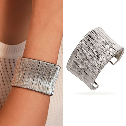 Handcrafted Gold-plated Geometric Cuff Bracelets And Boho-chic Metal Tassel Arm Rings With Vintage-inspired Exaggerated Water Drop Designs, Offering Unisex Luxury Accessories In Open Bangle Styles