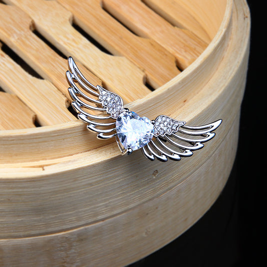 Angel wings brooch