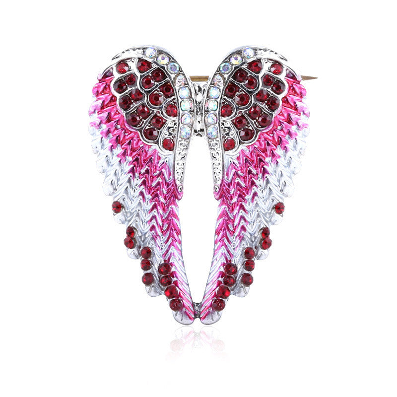 Angel wings brooch