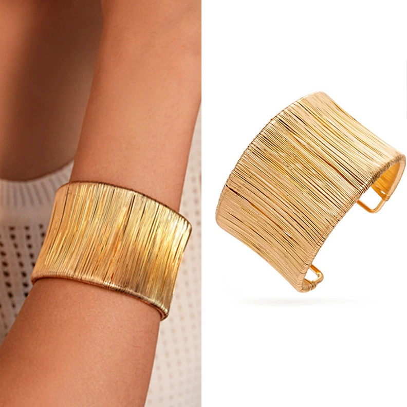Handcrafted Gold-plated Geometric Cuff Bracelets And Boho-chic Metal Tassel Arm Rings With Vintage-inspired Exaggerated Water Drop Designs, Offering Unisex Luxury Accessories In Open Bangle Styles